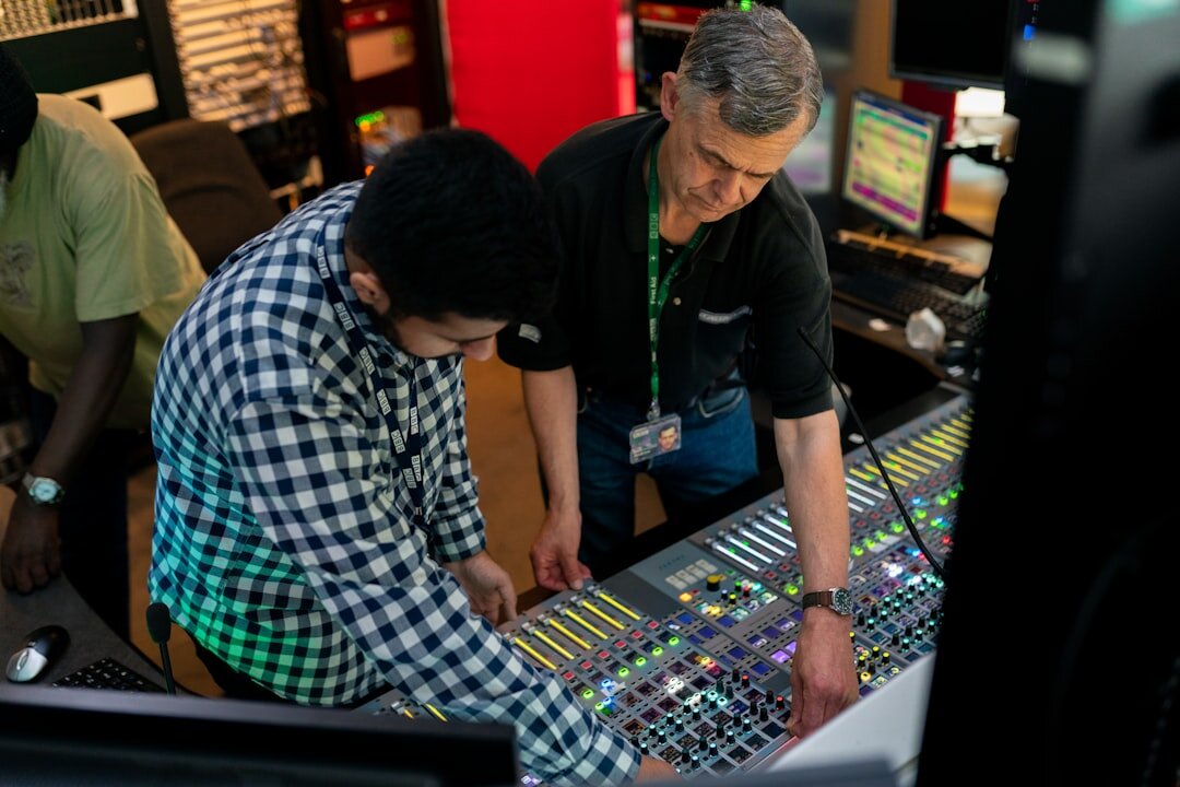 Diverse Brazilian production team collaborating in studio